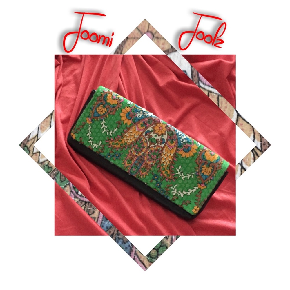 Joomi Joolz beautiful clutch 5” L, 12” W, 1” D